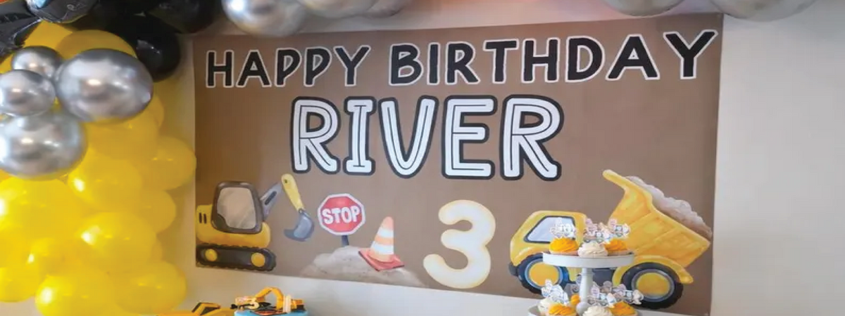 Personalized event banner at a construction themed birthday party